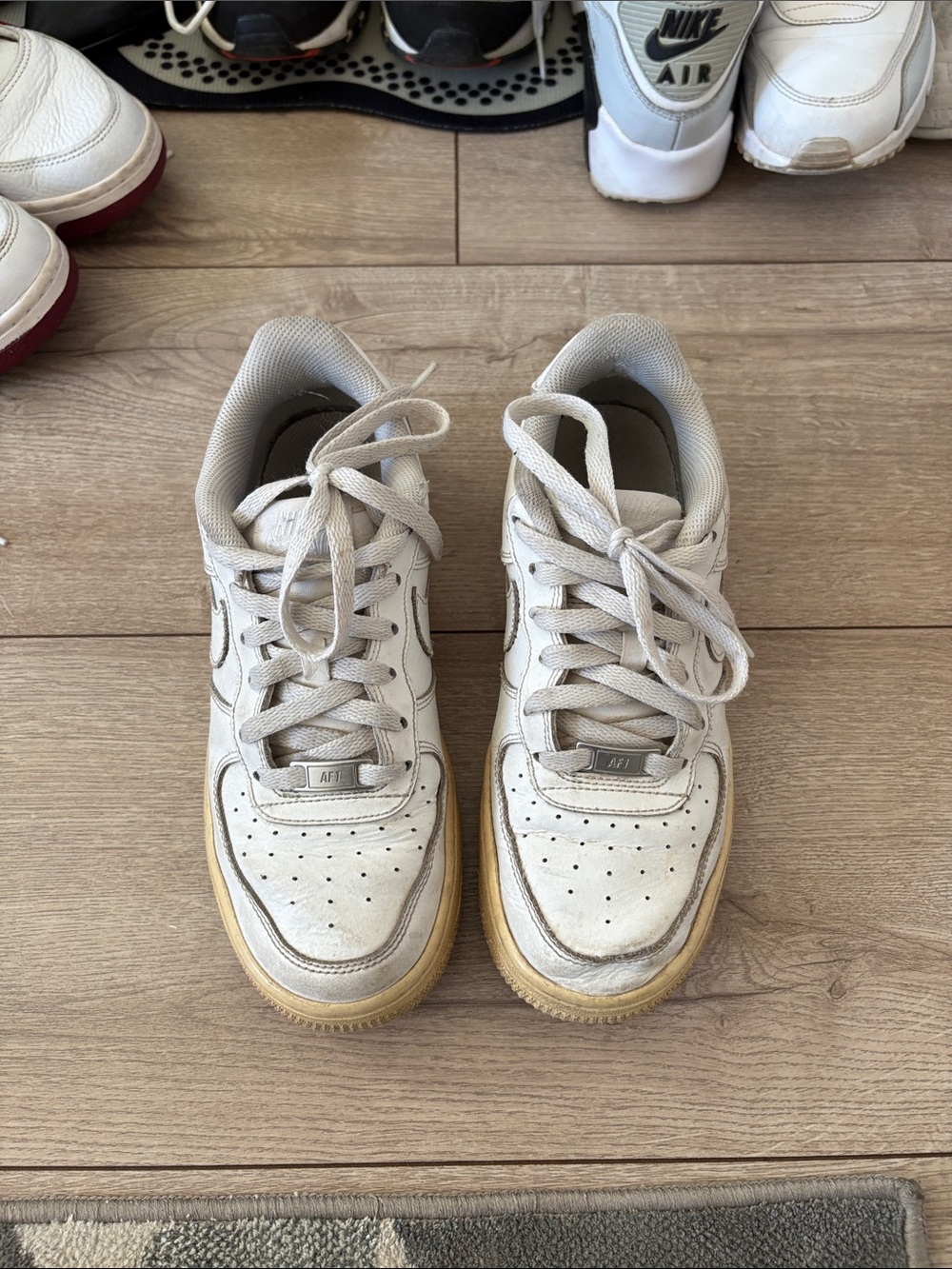 Nike White Leather Low-Top Sneakers with Yellowed Gum Sole